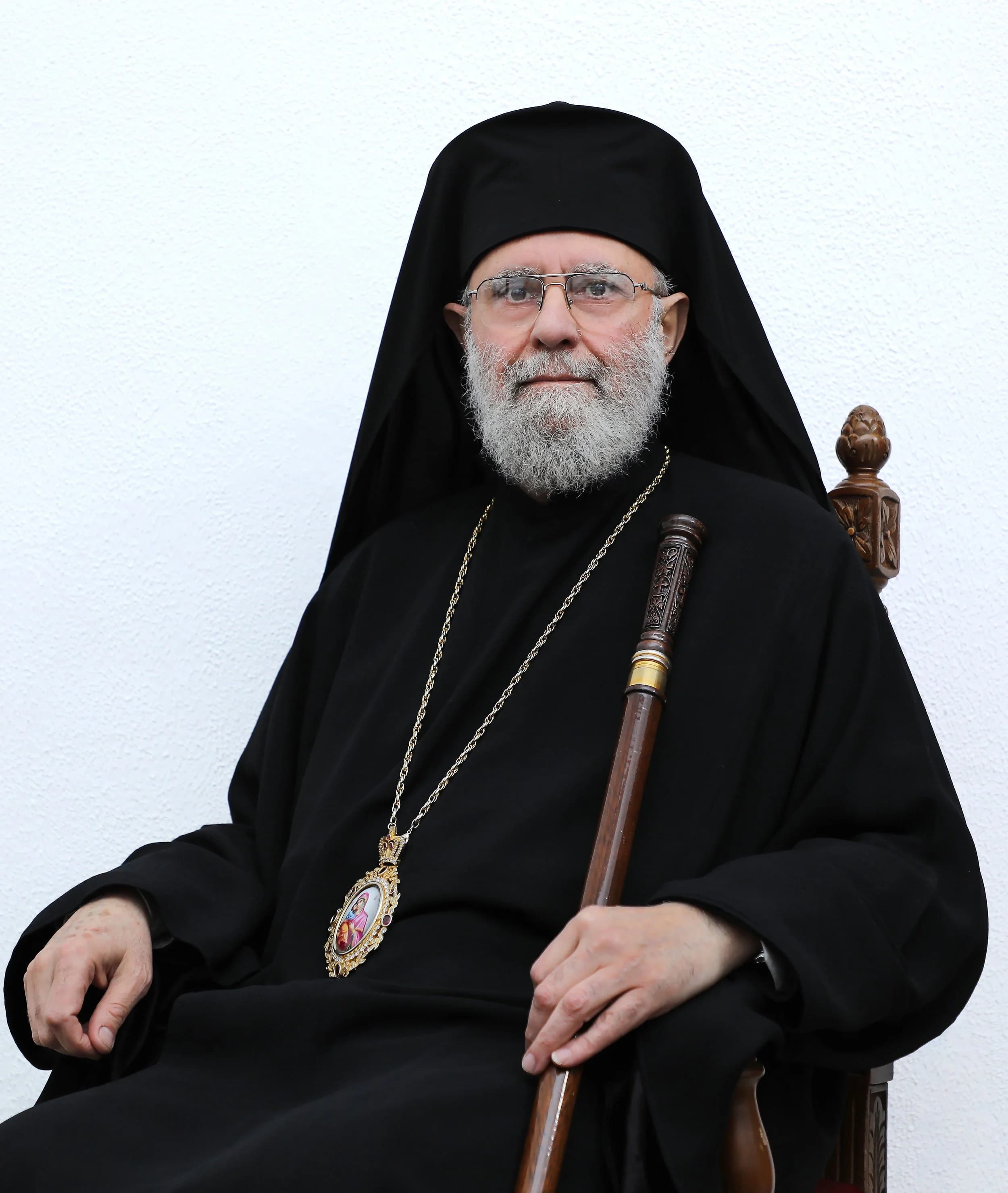 Official portrait of Metropolitan Saba seated in black clerical attire.